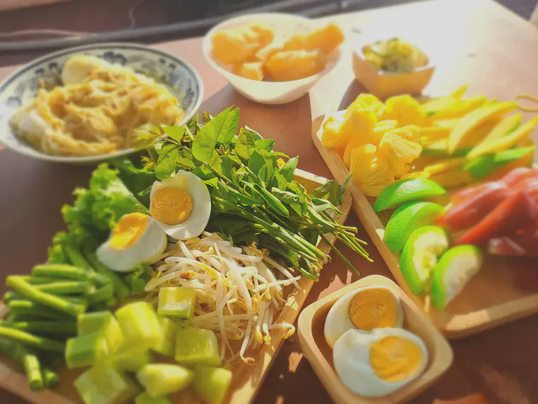 [Khanom chin](https://en.wikipedia.org/wiki/Khanom_chin) noodles with fish curry and assorted condiments.